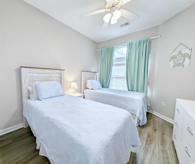 bedroom featuring ceiling fan and light wood-type flooring