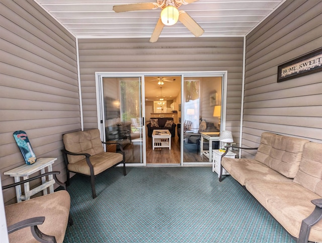 sunroom with ceiling fan