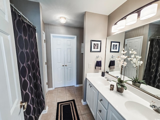 bathroom featuring vanity and tile patterned flooring