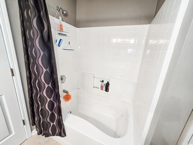 bathroom with shower / tub combo and tile patterned floors