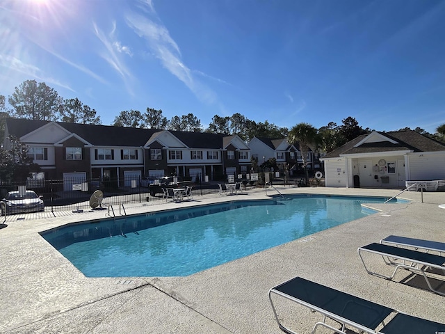 view of pool featuring a patio area