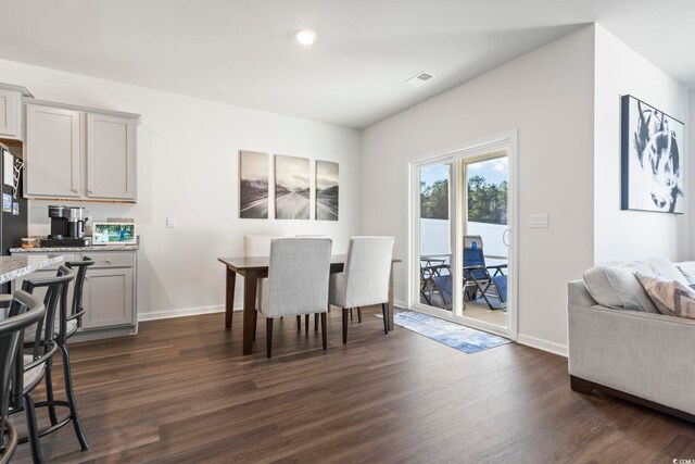 dining room with dark wood-type flooring