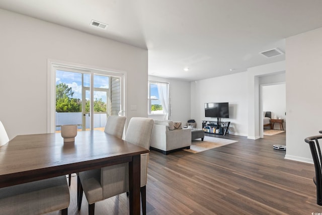 dining room featuring dark hardwood / wood-style flooring