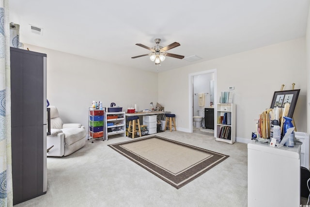 interior space featuring carpet floors and ceiling fan