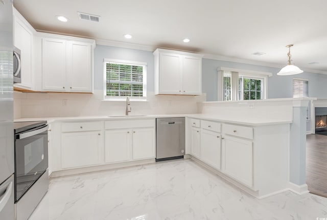 kitchen featuring sink, range with electric stovetop, stainless steel dishwasher, and kitchen peninsula