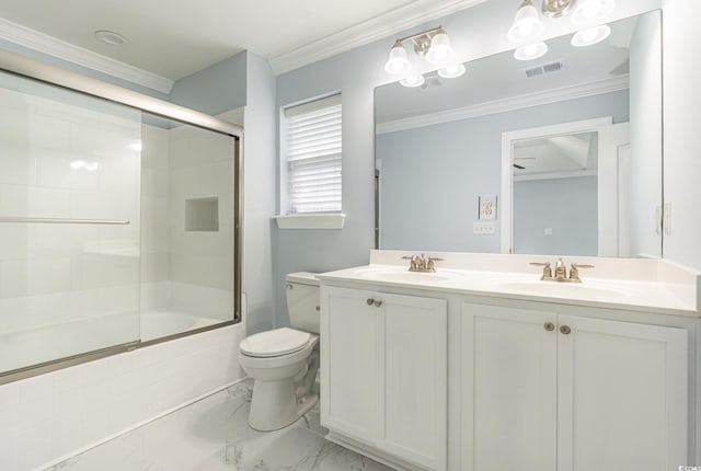 full bathroom with vanity, crown molding, bath / shower combo with glass door, and toilet