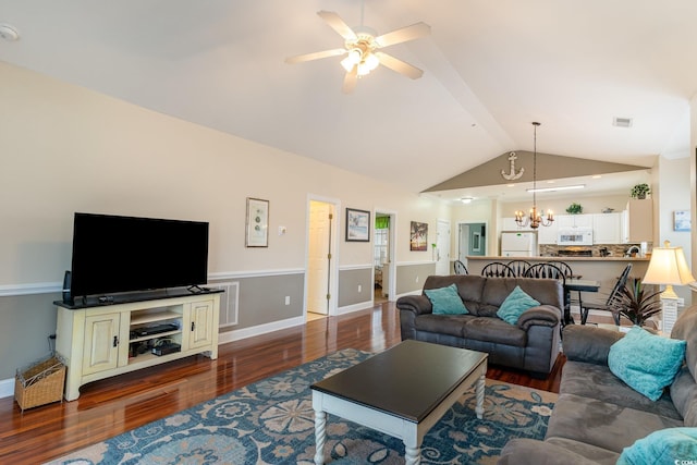 living room with visible vents, baseboards, lofted ceiling with beams, dark wood-type flooring, and ceiling fan with notable chandelier