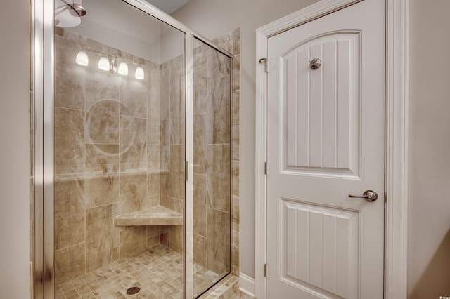 bathroom featuring an enclosed shower