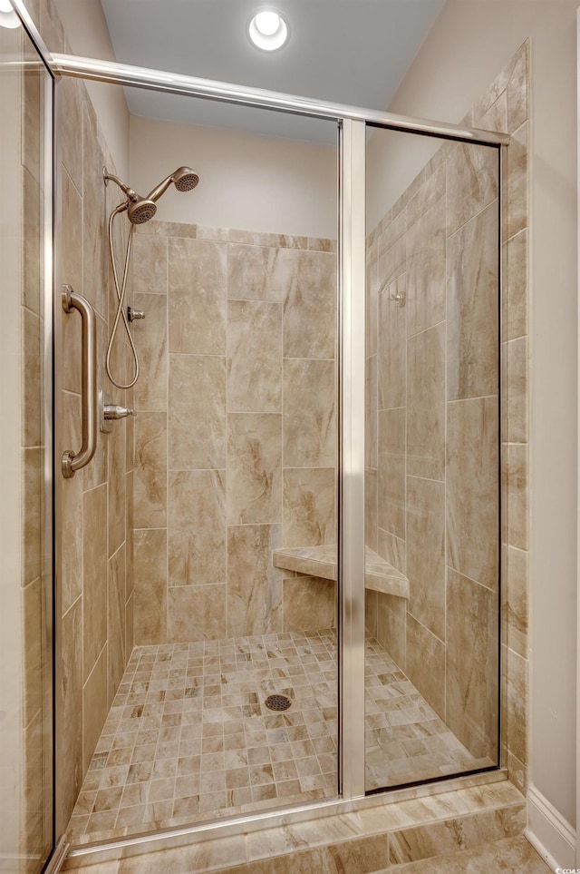 bathroom featuring walk in shower