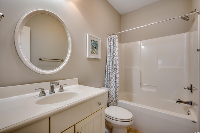 full bathroom with toilet, shower / tub combo, and vanity