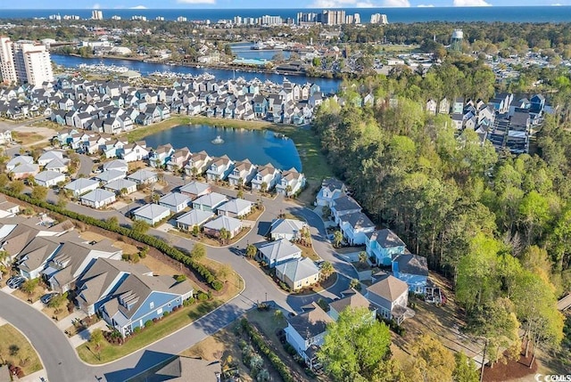 drone / aerial view with a water view