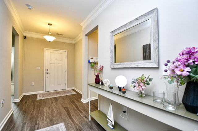 entryway featuring dark wood-type flooring and ornamental molding