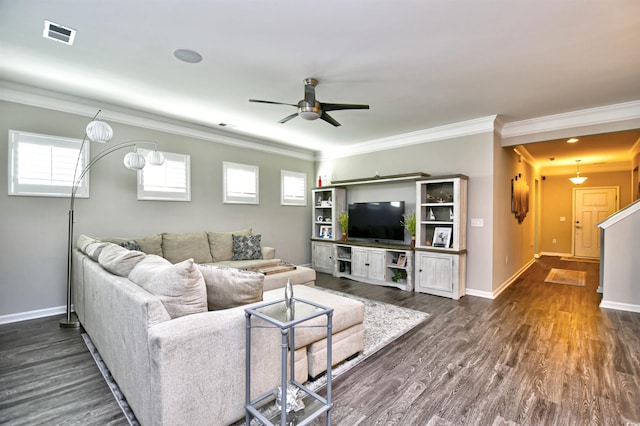 living room with crown molding, ceiling fan, and dark hardwood / wood-style flooring