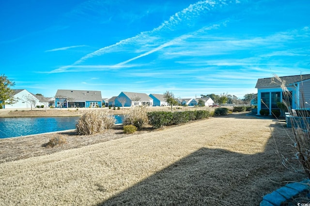 view of yard featuring a water view