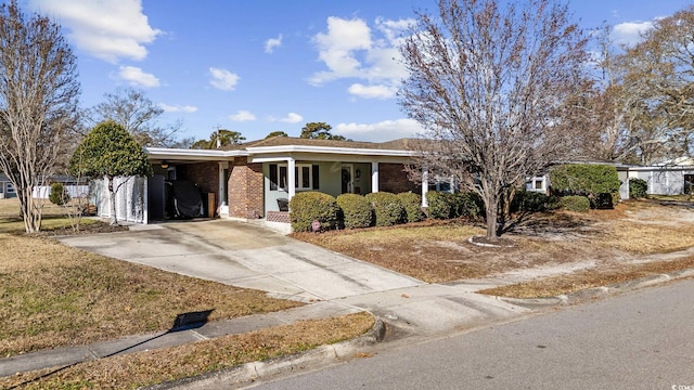 single story home with a carport