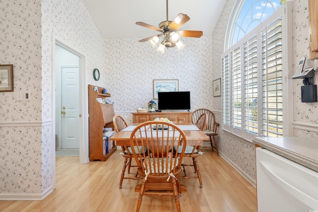 dining room with ceiling fan, plenty of natural light, and light wood-type flooring