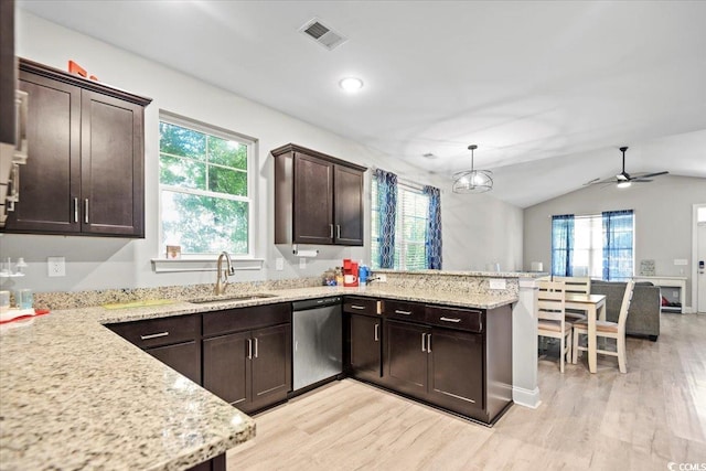 kitchen with kitchen peninsula, ceiling fan, dishwasher, pendant lighting, and sink