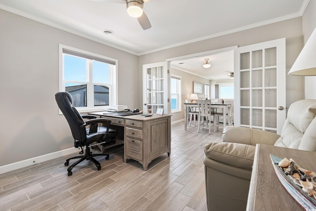 home office with french doors, ceiling fan, and crown molding