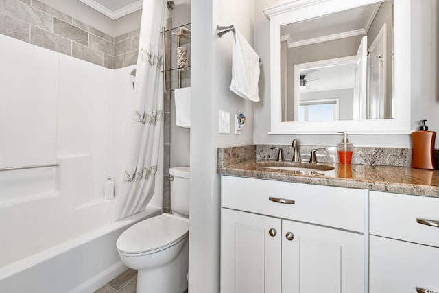 full bathroom featuring ornamental molding, ceiling fan, toilet, shower / bath combo with shower curtain, and vanity