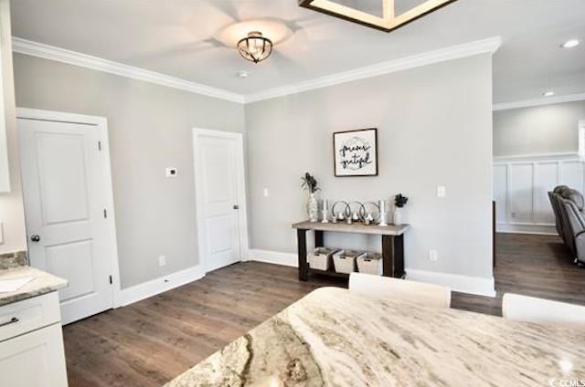 bedroom featuring dark hardwood / wood-style flooring and crown molding