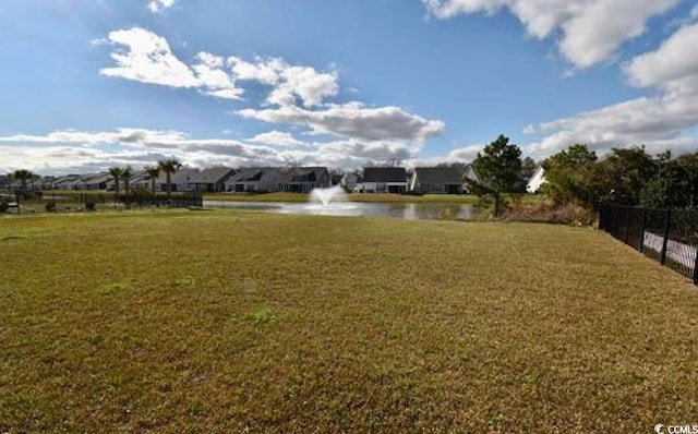 view of yard with a water view