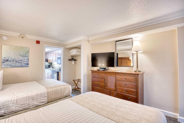 bedroom featuring ornamental molding, a textured ceiling, and hardwood / wood-style flooring