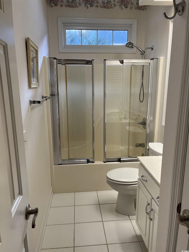 35 Dornoch Dr, Pawleys Island, SC 29585 - full bath with shower / bath combination with glass door, toilet, tile patterned flooring, and vanity