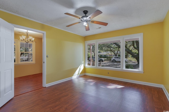 unfurnished room featuring ceiling fan with notable chandelier, hardwood / wood-style floors, and a textured ceiling