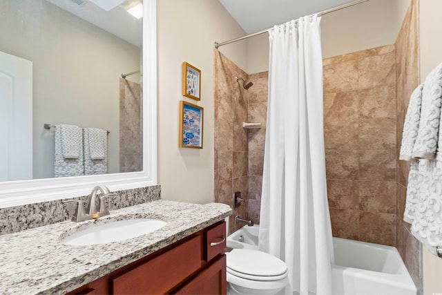 full bathroom featuring toilet, vanity, and shower / bath combination with curtain