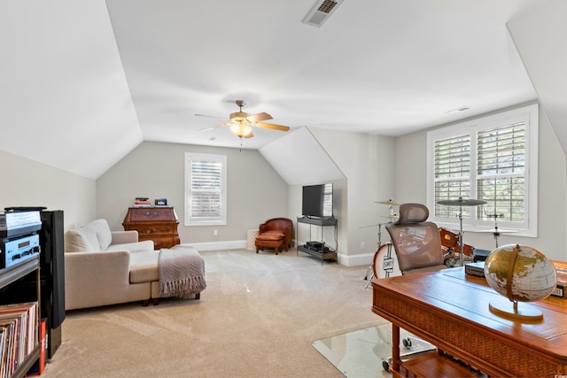 office area with light carpet, ceiling fan, and vaulted ceiling