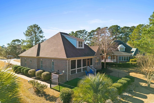 back of house featuring a yard