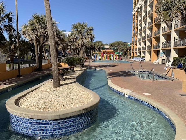 6900 N Ocean Blvd Unit 614, Myrtle Beach, SC 29572 - community pool featuring a community hot tub