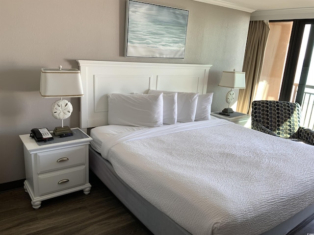 6900 N Ocean Blvd Unit 614, Myrtle Beach, SC 29572 - bedroom with dark wood-type flooring