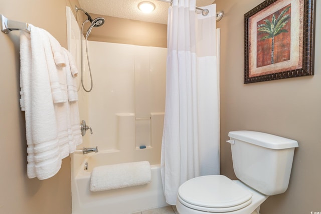 bathroom featuring toilet, a textured ceiling, and shower / tub combo