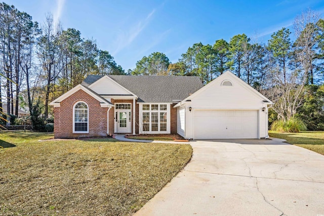 ranch-style house with a front lawn and a garage