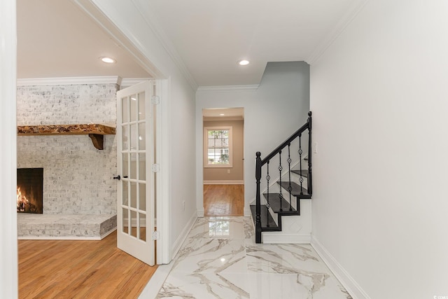 106 Governor Boone Ln, Georgetown, SC 29440 - foyer entrance with crown molding, a fireplace, stairway, baseboards, and recessed lighting