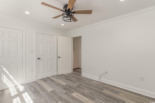 106 Governor Boone Ln, Georgetown, SC 29440 - unfurnished bedroom with recessed lighting, baseboards, a ceiling fan, wood finished floors, and ornamental molding
