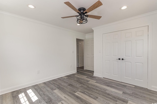 106 Governor Boone Ln, Georgetown, SC 29440 - unfurnished bedroom with baseboards, recessed lighting, and wood finished floors