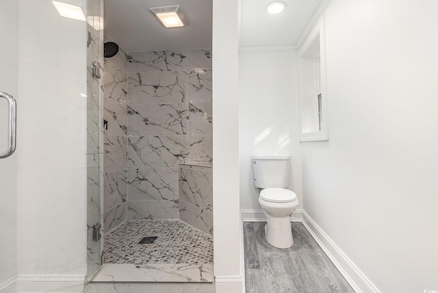 106 Governor Boone Ln, Georgetown, SC 29440 - bathroom with a marble finish shower, baseboards, toilet, and wood finished floors
