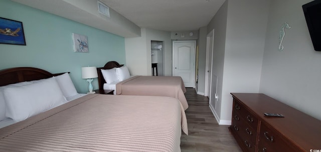 bedroom featuring hardwood / wood-style floors