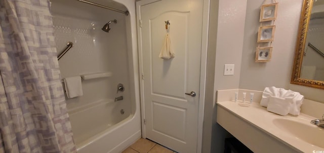 bathroom with shower / bathtub combination with curtain, vanity, and tile patterned floors