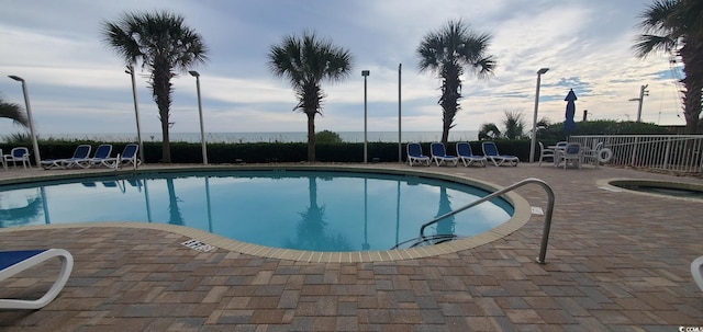 view of pool featuring a patio