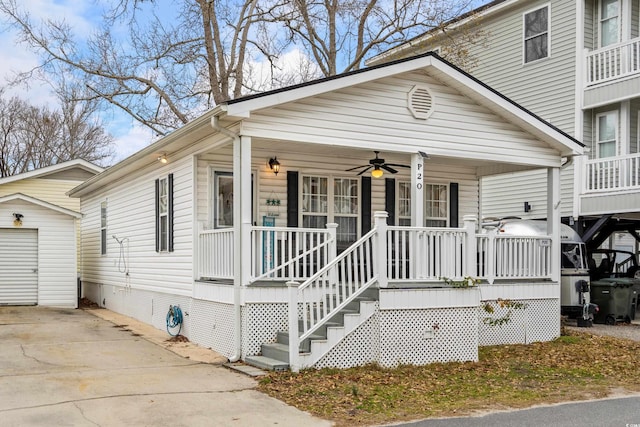 view of front of home with ceiling fan and a porch