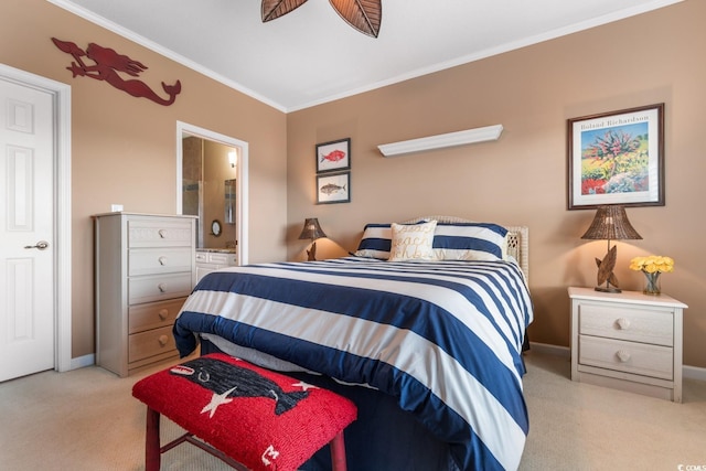 carpeted bedroom featuring connected bathroom, ceiling fan, and crown molding