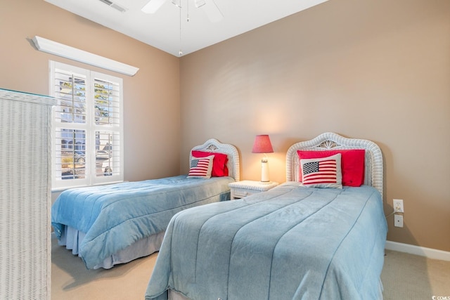 bedroom with light colored carpet and ceiling fan