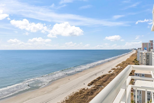 view of water feature with a beach view