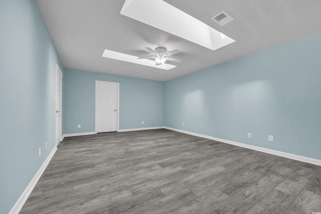 unfurnished room featuring ceiling fan and light hardwood / wood-style flooring