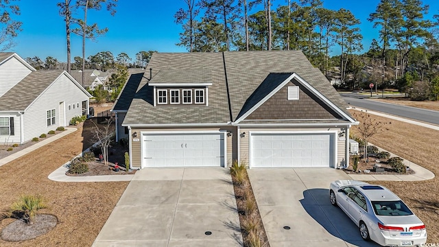 view of front of property with a garage