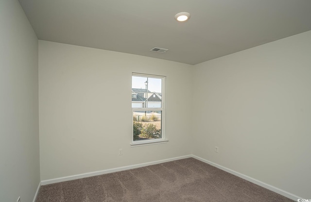 empty room featuring carpet