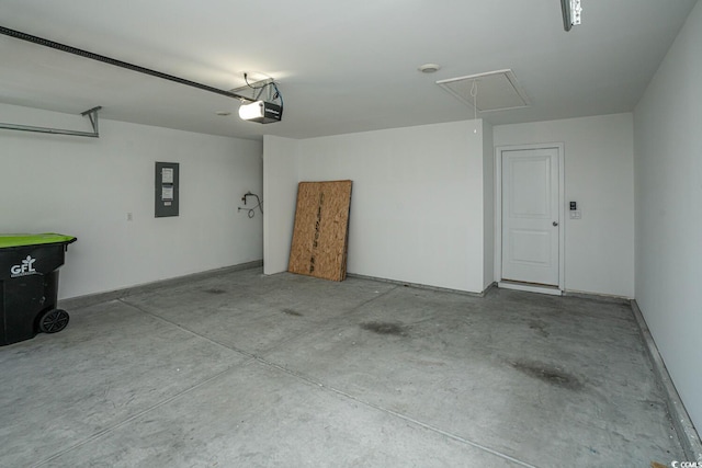 garage featuring electric panel and a garage door opener